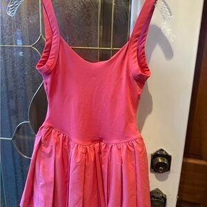 Beautiful LULULEMON COURT CRUSH TENNIS DRESS! In a coral like color!!  NWOT